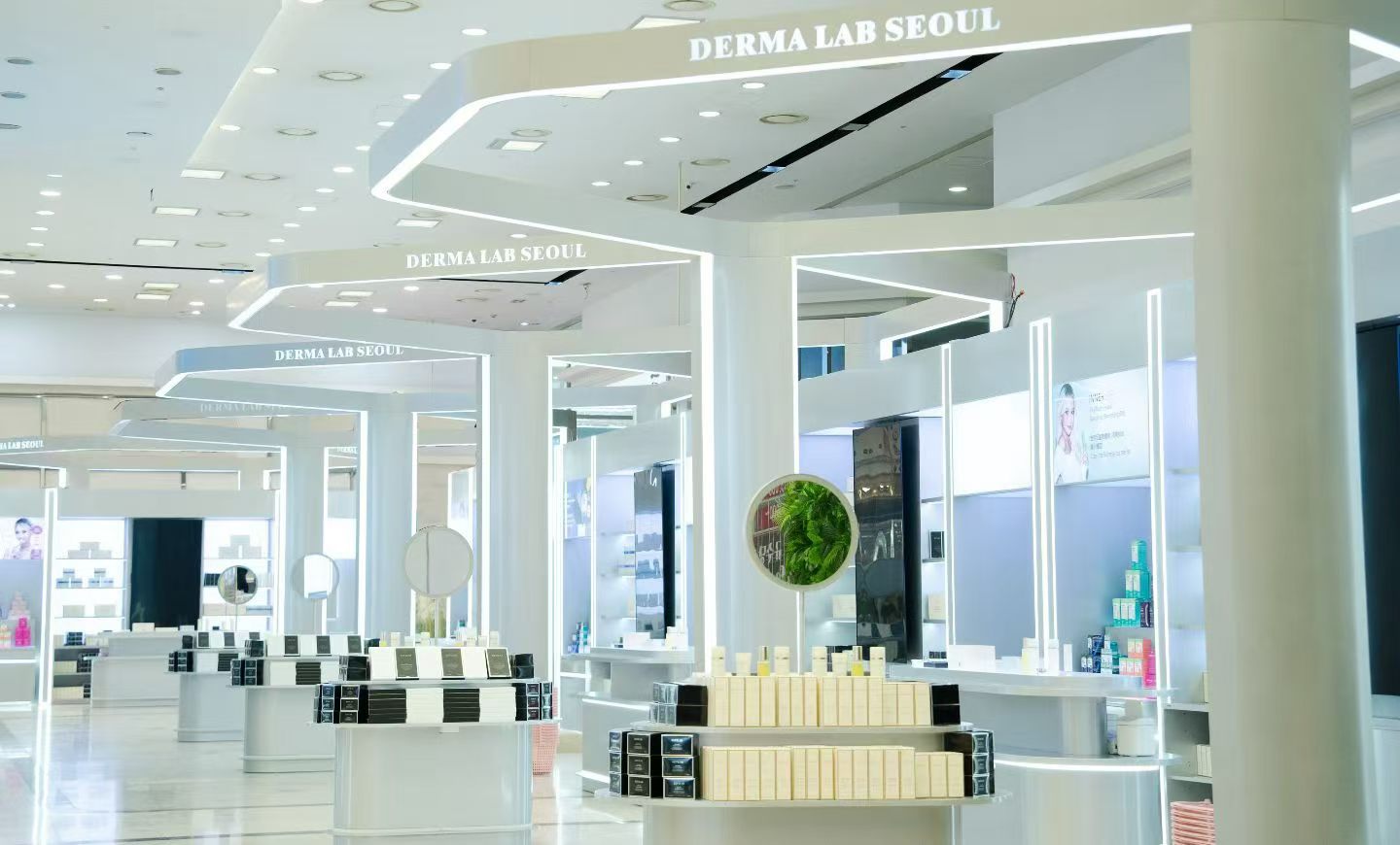 Illuminated beauty counters and repeated display bays in a completed store