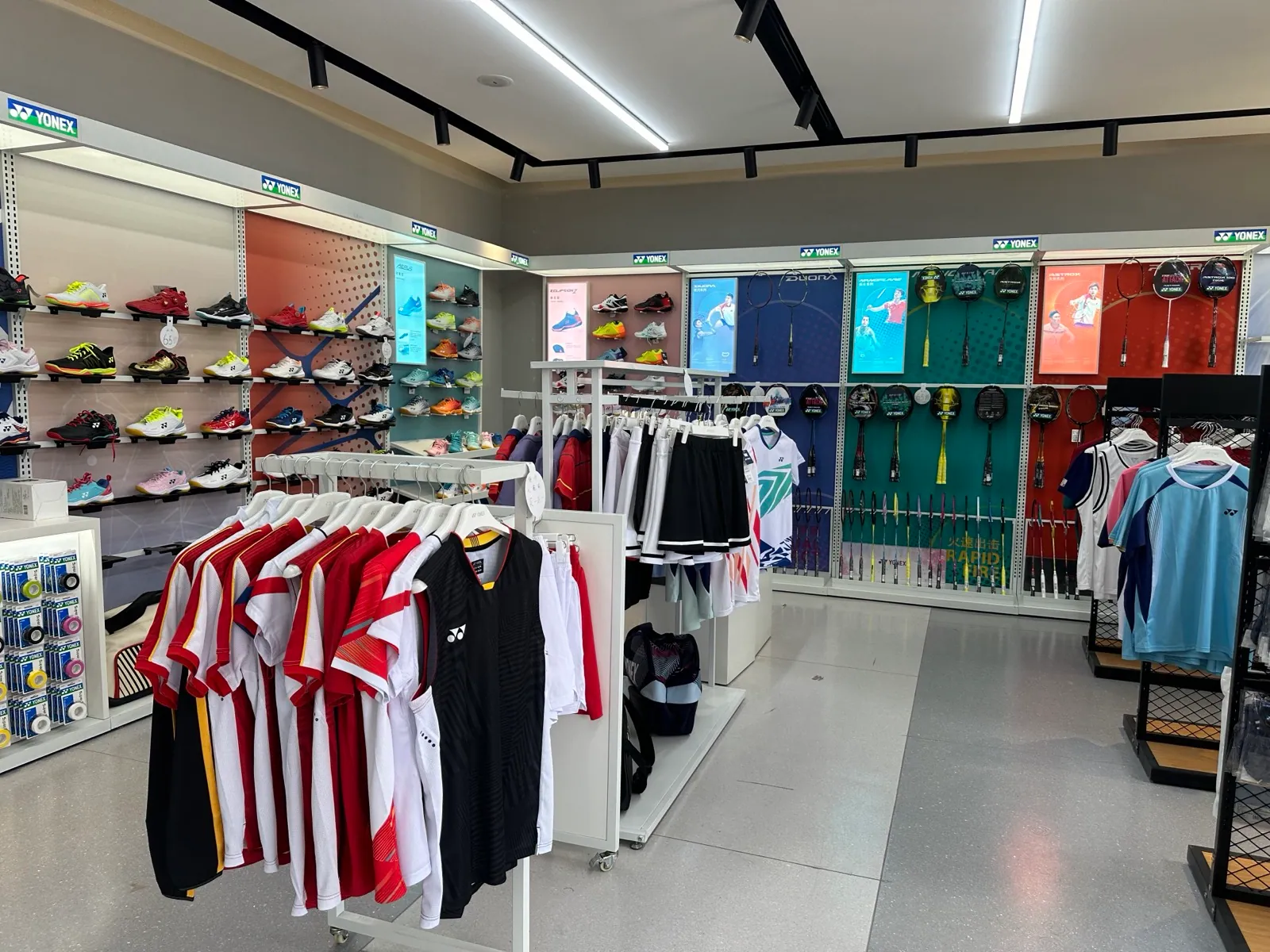 Footwear walls, garment rails and sports equipment displays.