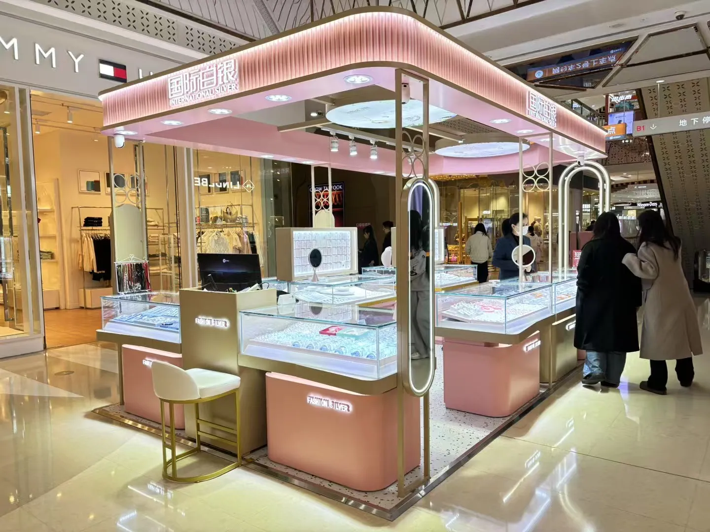 Pink jewellery counters with a metal canopy